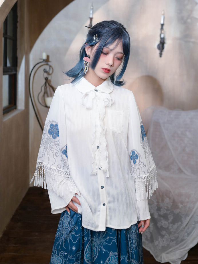 ‘Blue Tears’ printed white shirt with Peter Pan collar and layered sleeves