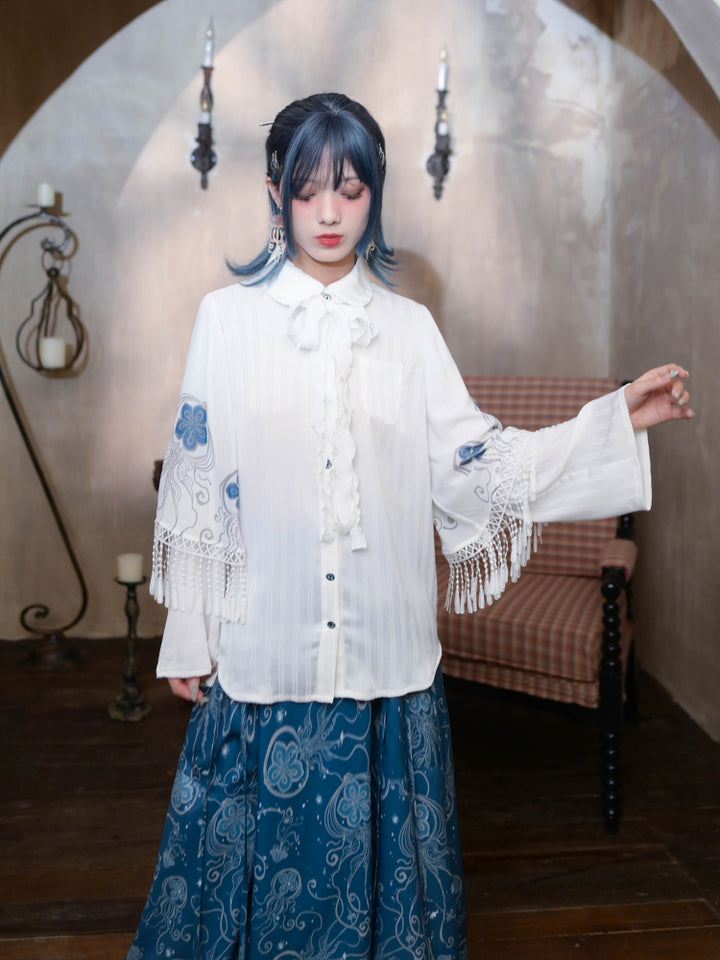 ‘Blue Tears’ printed white shirt with Peter Pan collar and layered sleeves