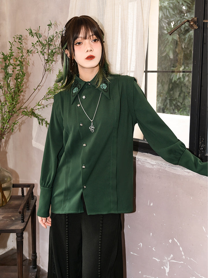Dark green Chinese-inspired embroidered shirt with asymmetrical pointed collar