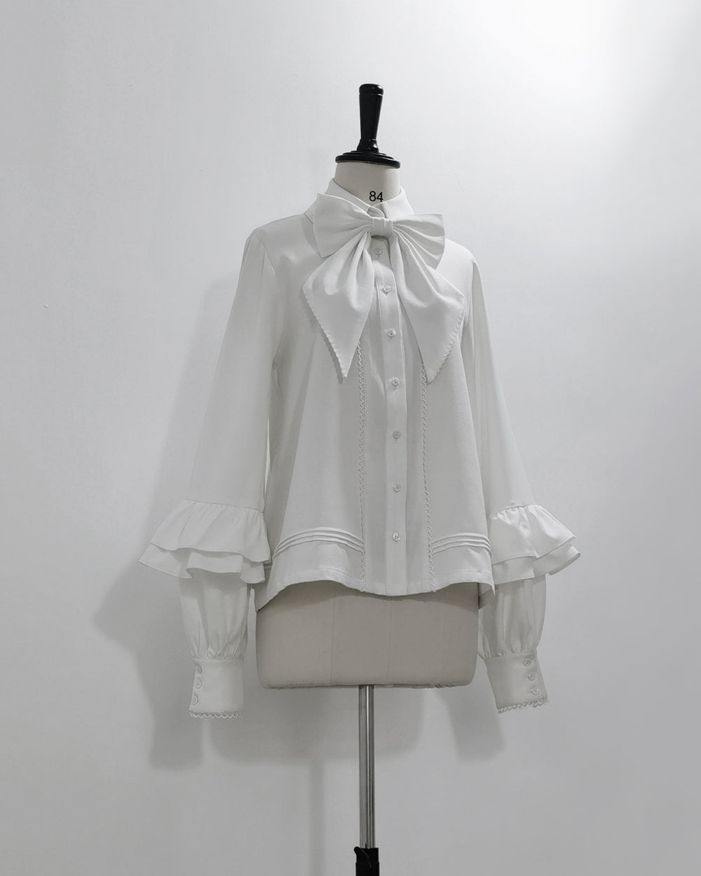Elegant White Bow Blouse with Ruffle Sleeves