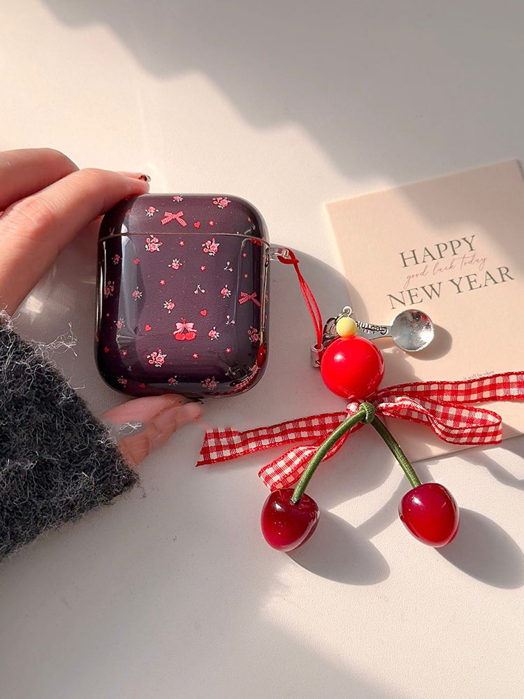 Bow and floral print AirPods case