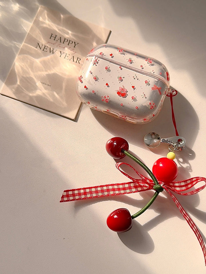 Bow and floral print AirPods case
