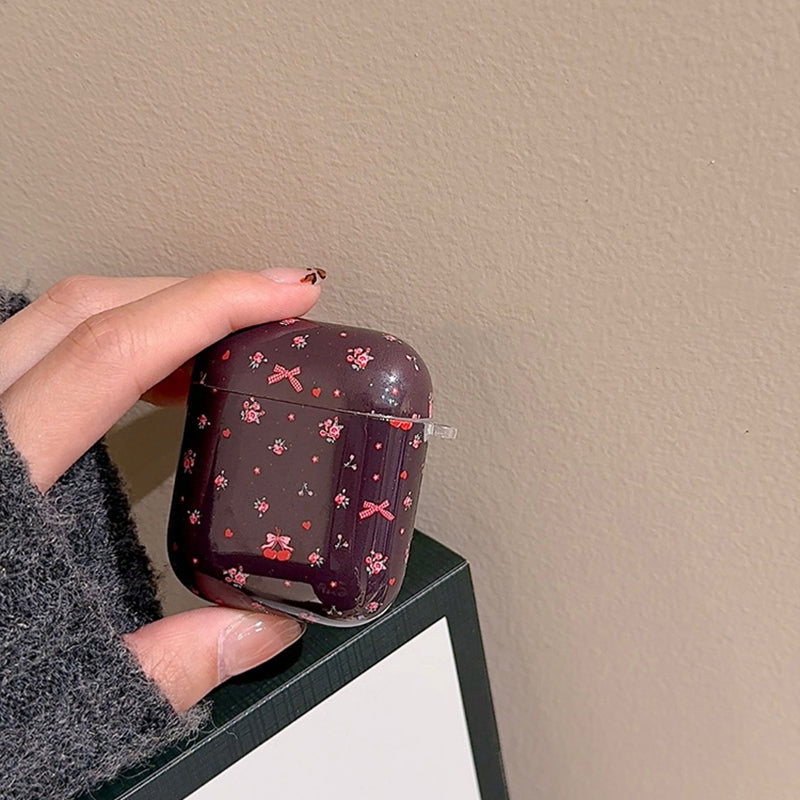 Bow and floral print AirPods case