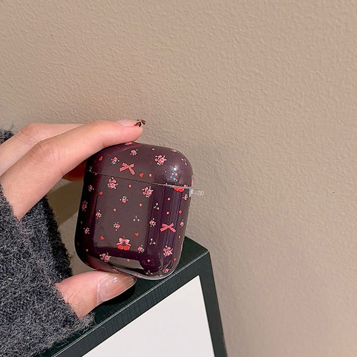 Bow and floral print AirPods case