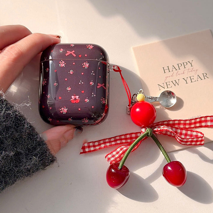 Bow and floral print AirPods case