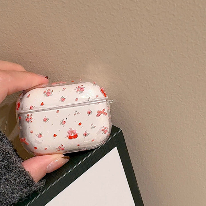 Bow and floral print AirPods case