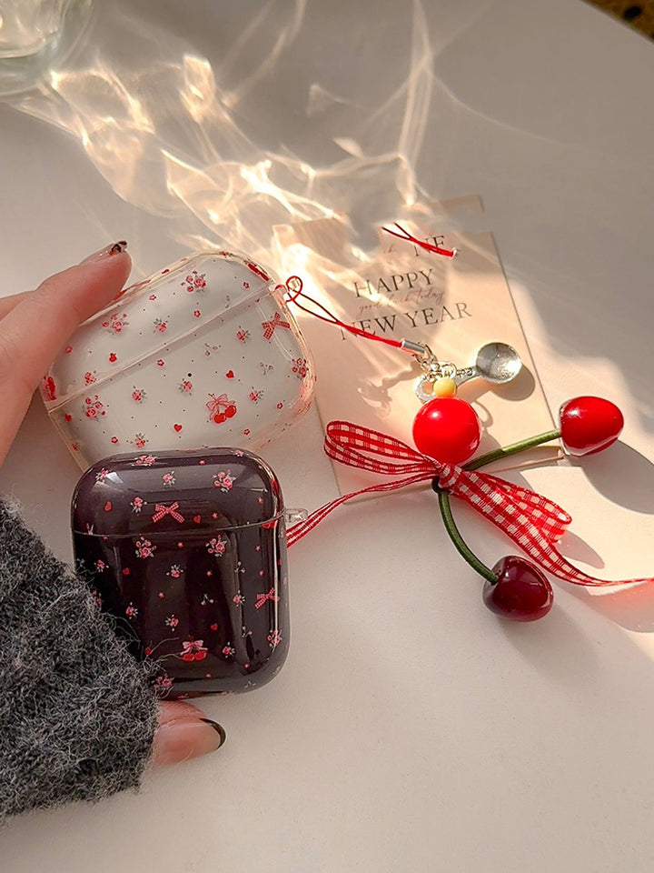 Bow and floral print AirPods case